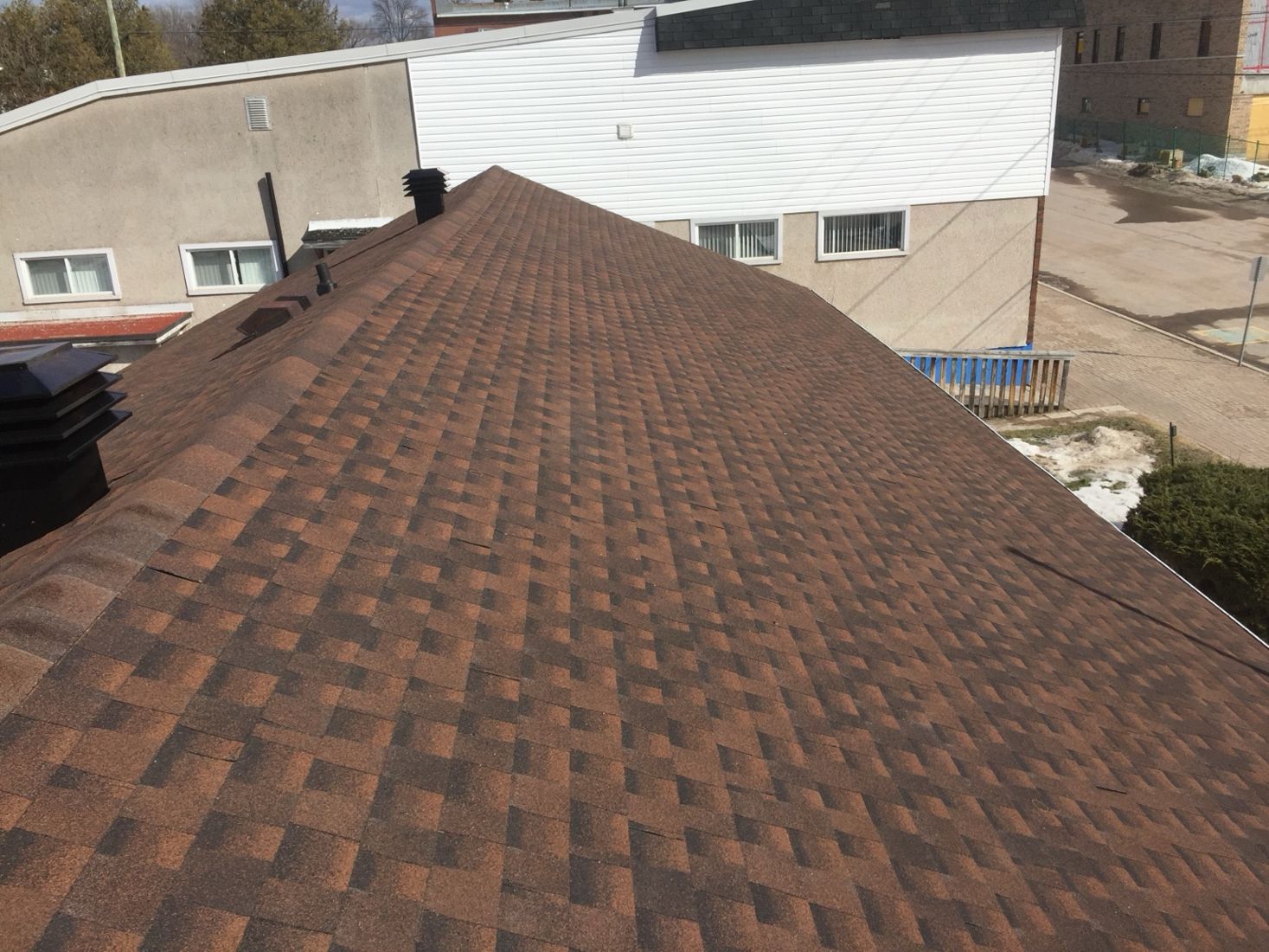 Completed architectural shingle roof by Sunrise Roofing